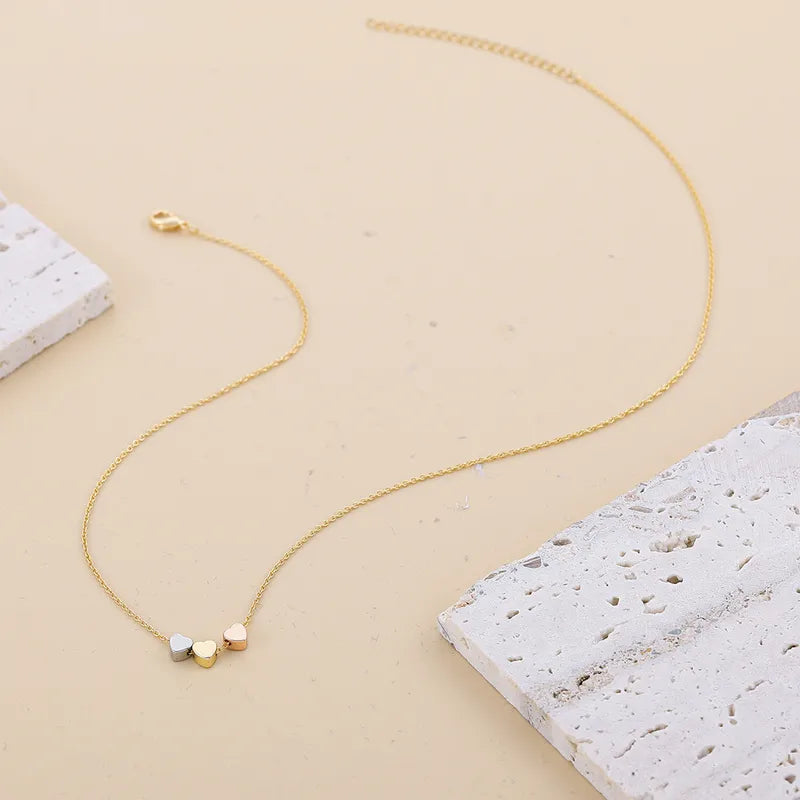Anti Tarnish Stainless Steel Minimal Tri-Tone Three Mini Heart Necklace - Gold, Silver, and Rose Gold | Triple Heart Pendant