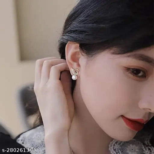 THE SWAN'S EMBRACE - GOLDEN EMBELLISHED EARRINGS | SWAN PEARL EARRINGS