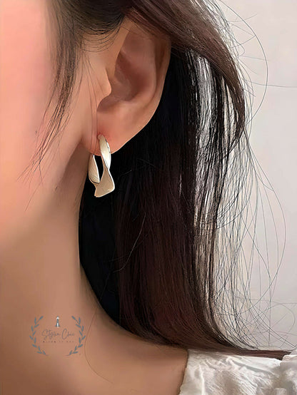 The Twisted Crescent | Twisted Hoop Earrings | Sober Earrings | Work Wear Jewellery | White Twisted Hoops | Purple Twisted Hoops