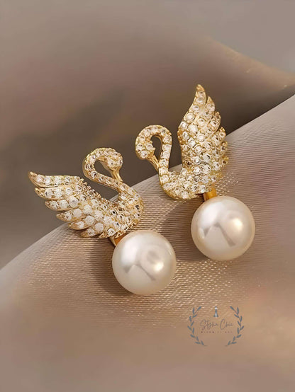 THE SWAN'S EMBRACE - GOLDEN EMBELLISHED EARRINGS | SWAN PEARL EARRINGS